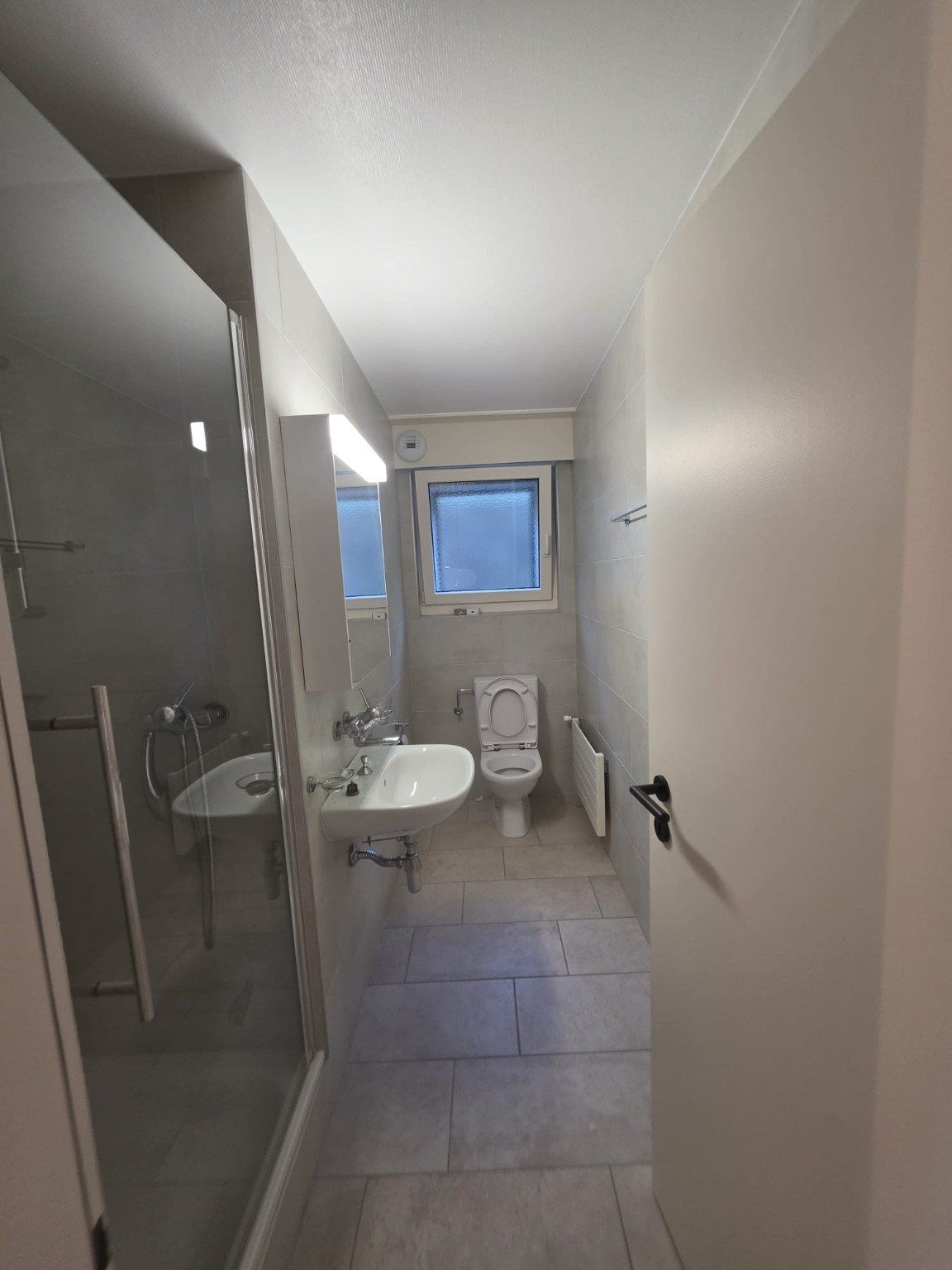 Salle d’eau remise à neuf dans l’appartement rénové à Vevey